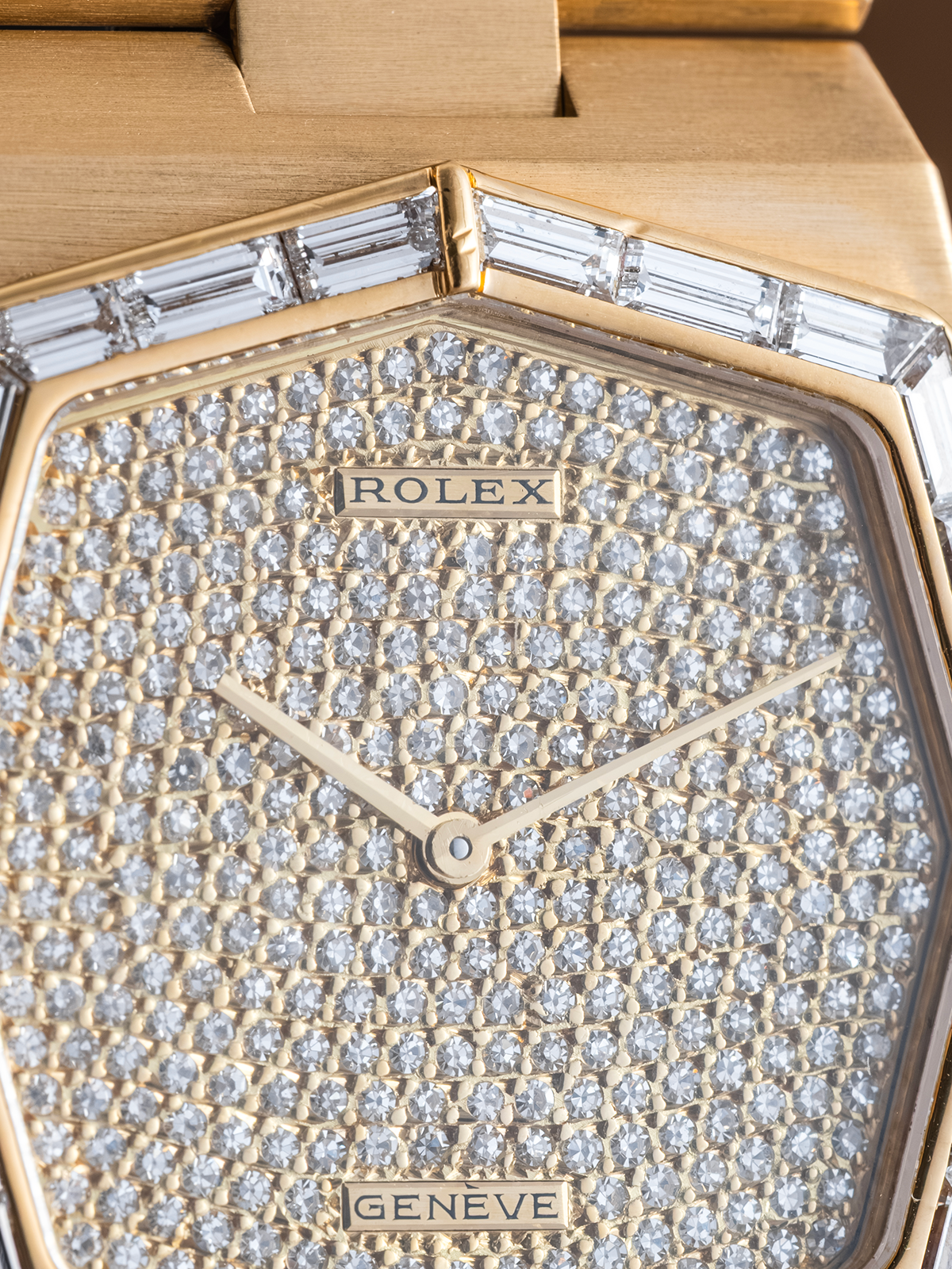 Close-up of a Rolex watch face with diamond-studded bezel