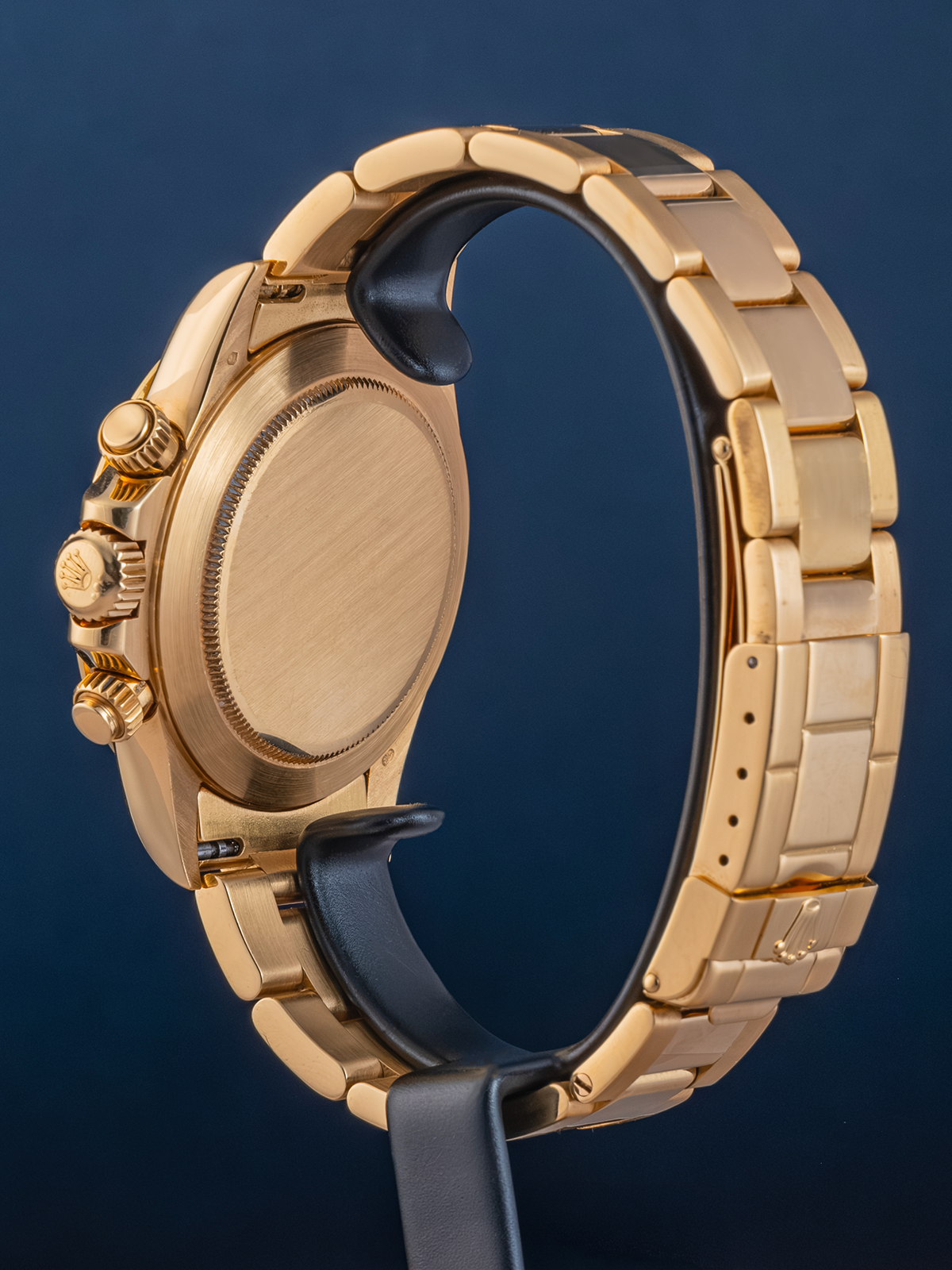 Gold watch with a blue background