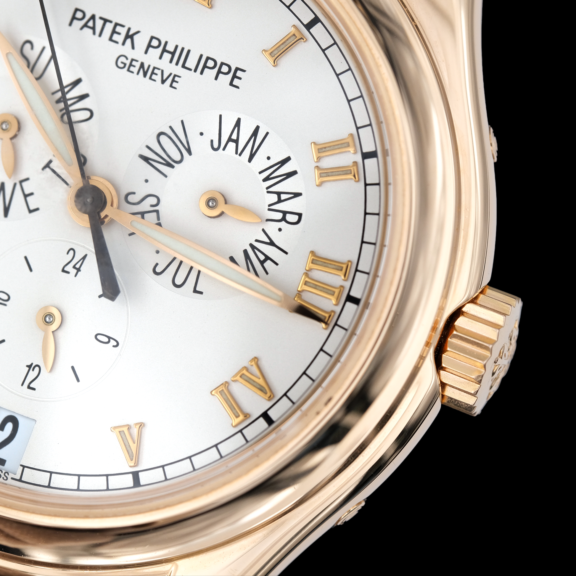 Patek Philippe watch with a detailed face on a black background